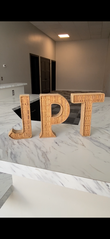 JPT wicker letters on the marble reception counter